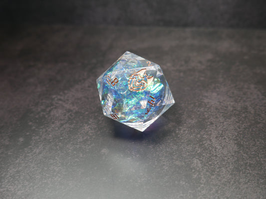 stunning blue and clear d20 die with a liquid core