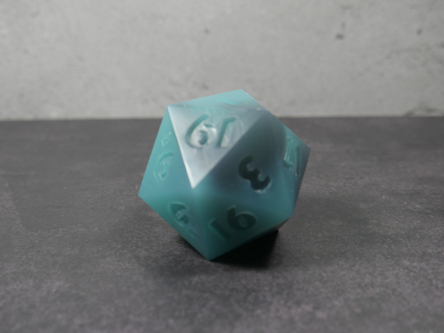 Emotional Support Squishy Dice (translucent teal & black)